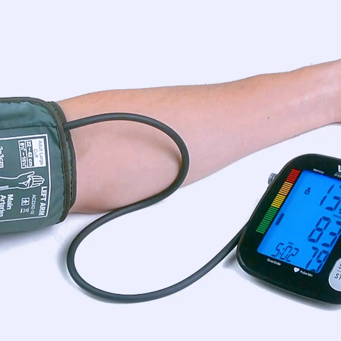 taking blood pressure with upper arm cuff