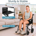 Woman using a black manual wheelchair in a living room. Text stating wheelchair safely supports up to 250 lbs