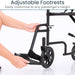 Wheelchair with adjustable footrests being adjusted by a person's hands
