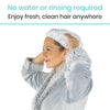 woman washing hair with shampoo cap